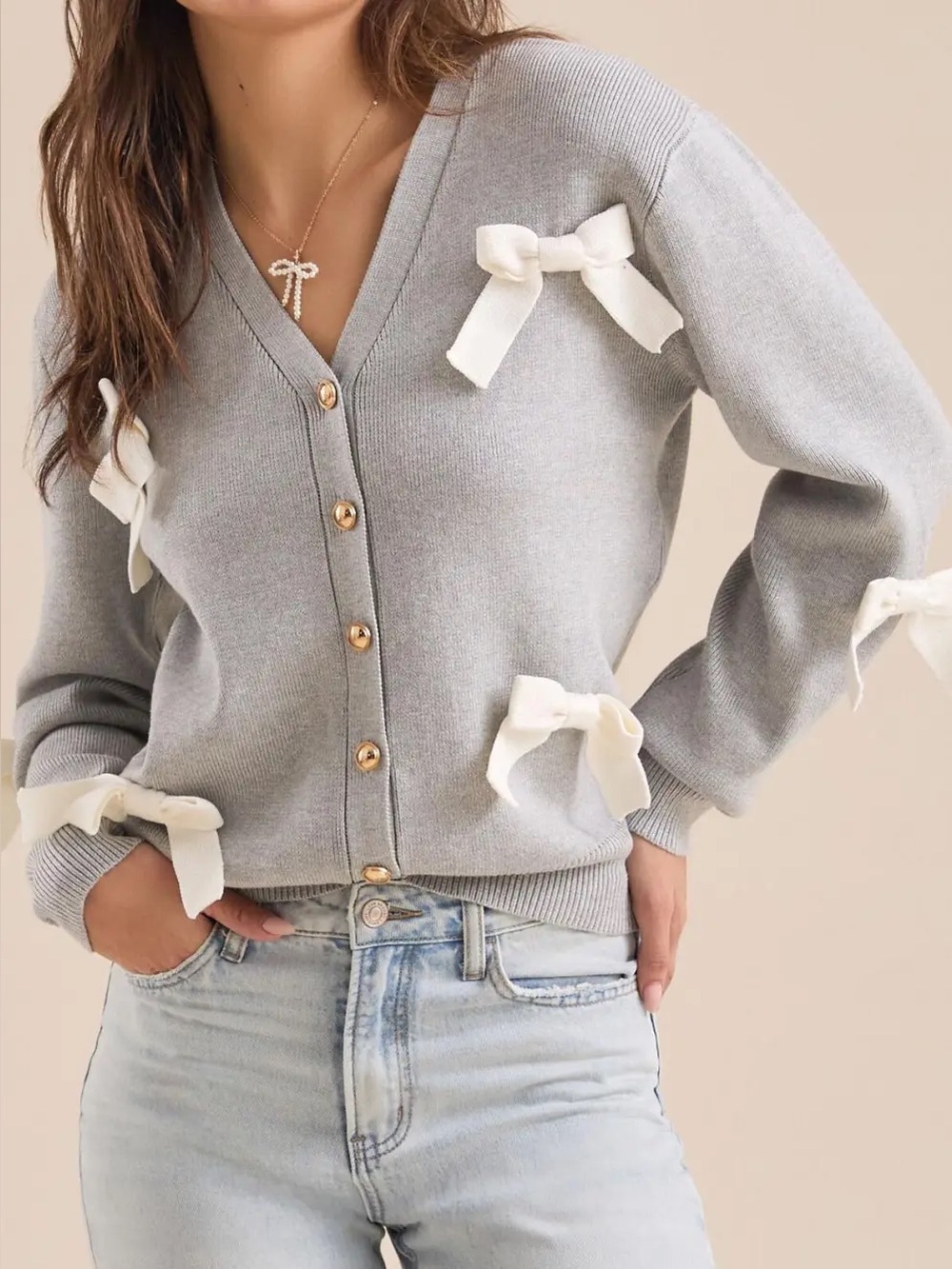 Altar'd State button-up cardigan sweater in grey with white bow appliqués